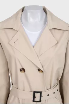 Beige trench coat with tag