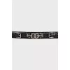 Patent leather belt with silver buckle