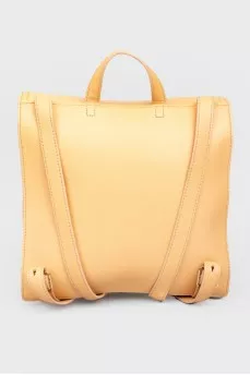 Rectangular leather backpack with tag
