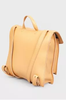 Rectangular leather backpack with tag