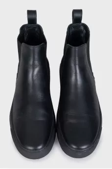 Men's black boots with brand logo