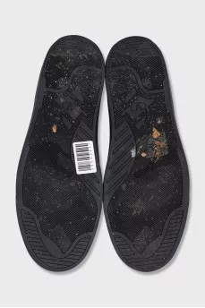 Men's black boots with brand logo
