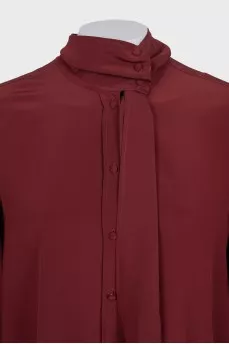 Loose blouse with a high collar