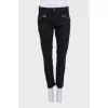 Straight-leg black jeans with fringe