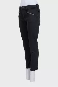 Straight-leg black jeans with fringe