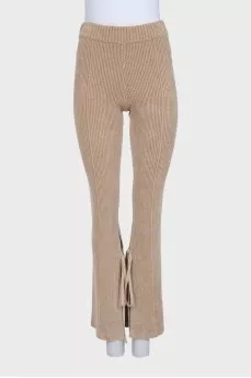 Brown flared trousers with tag