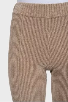 Brown flared trousers with tag
