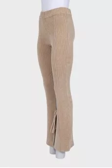 Brown flared trousers with tag