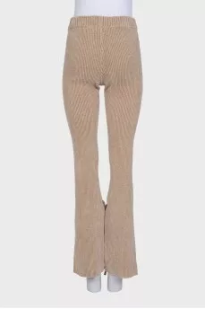 Brown flared trousers with tag