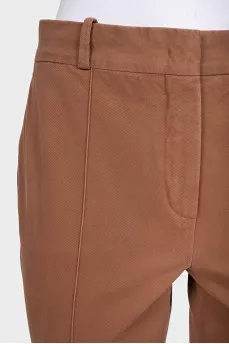 Brown cropped trousers with creases