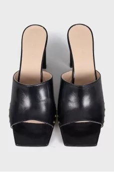 Black mules with gold rhinestones