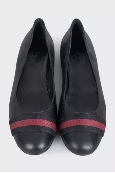 Black leather ballet flats with decoration