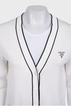 White cardigan with embroidered logo and seam accents