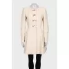 Beige coat with button-down logo