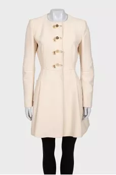 Beige coat with button-down logo