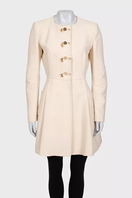 Beige coat with button-down logo