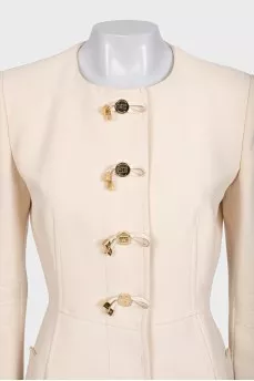 Beige coat with button-down logo