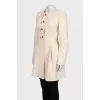 Beige coat with button-down logo
