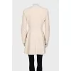 Beige coat with button-down logo