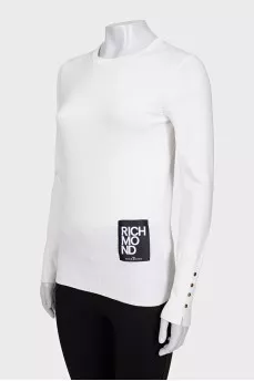 White jumper with gold decor on the sleeves