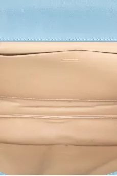 Блакитна сумка через плече з тисненням