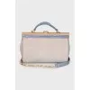 Suede bag with gold hardware