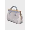 Suede bag with gold hardware