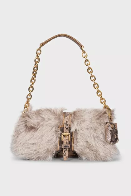 Leather bag decorated with fur