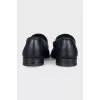 Men's leather loafers with silver hardware
