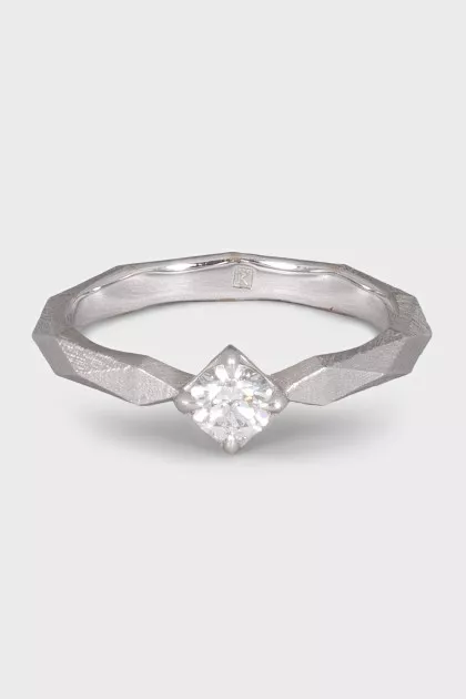 White gold ring with a diamond