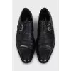 Men's black shoes with a long toe