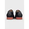 Men's blue suede shoes with logo