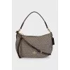 Textile bag with leather strap
