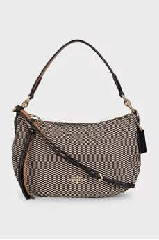 Textile bag with leather strap