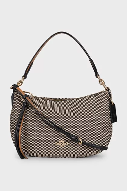 Textile bag with leather strap