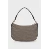 Textile bag with leather strap