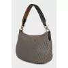 Textile bag with leather strap