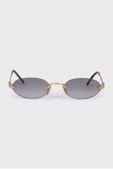 Oval sunglasses with gold hardware