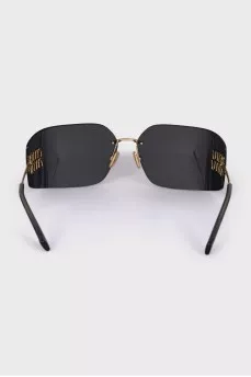 Wide sunglasses with gold logo