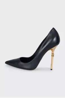 Black shoes with a curved heel