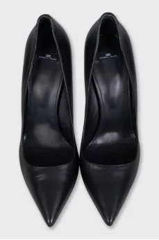 Black shoes with a curved heel