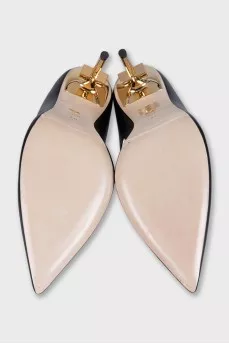 Black shoes with a curved heel