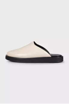 Beige leather clogs