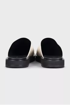 Beige leather clogs