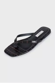 Leather flip-flops decorated with embossing