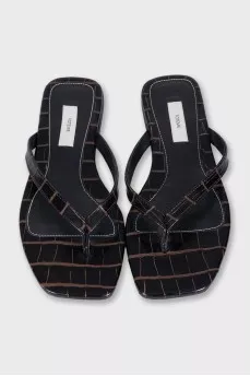 Leather flip-flops decorated with embossing