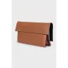 Brown embossed crossbody