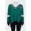 Oversized pullover decorated with crystals
