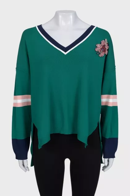 Oversized pullover decorated with crystals