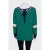 Oversized pullover decorated with crystals